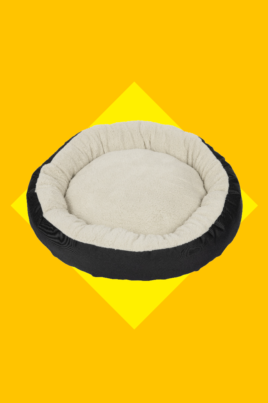 Apaļa mājdzīvnieku gulta ar melnu ārējo slāni un baltu pūkainu iekšpusi.